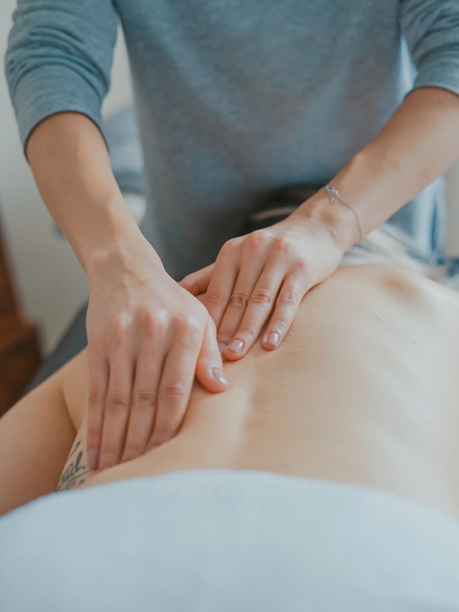 Hands giving a botanical oil massage